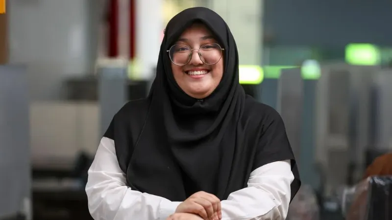 ‘Living the dream’: Why a young lawyer chooses to serve migrant workers full-time